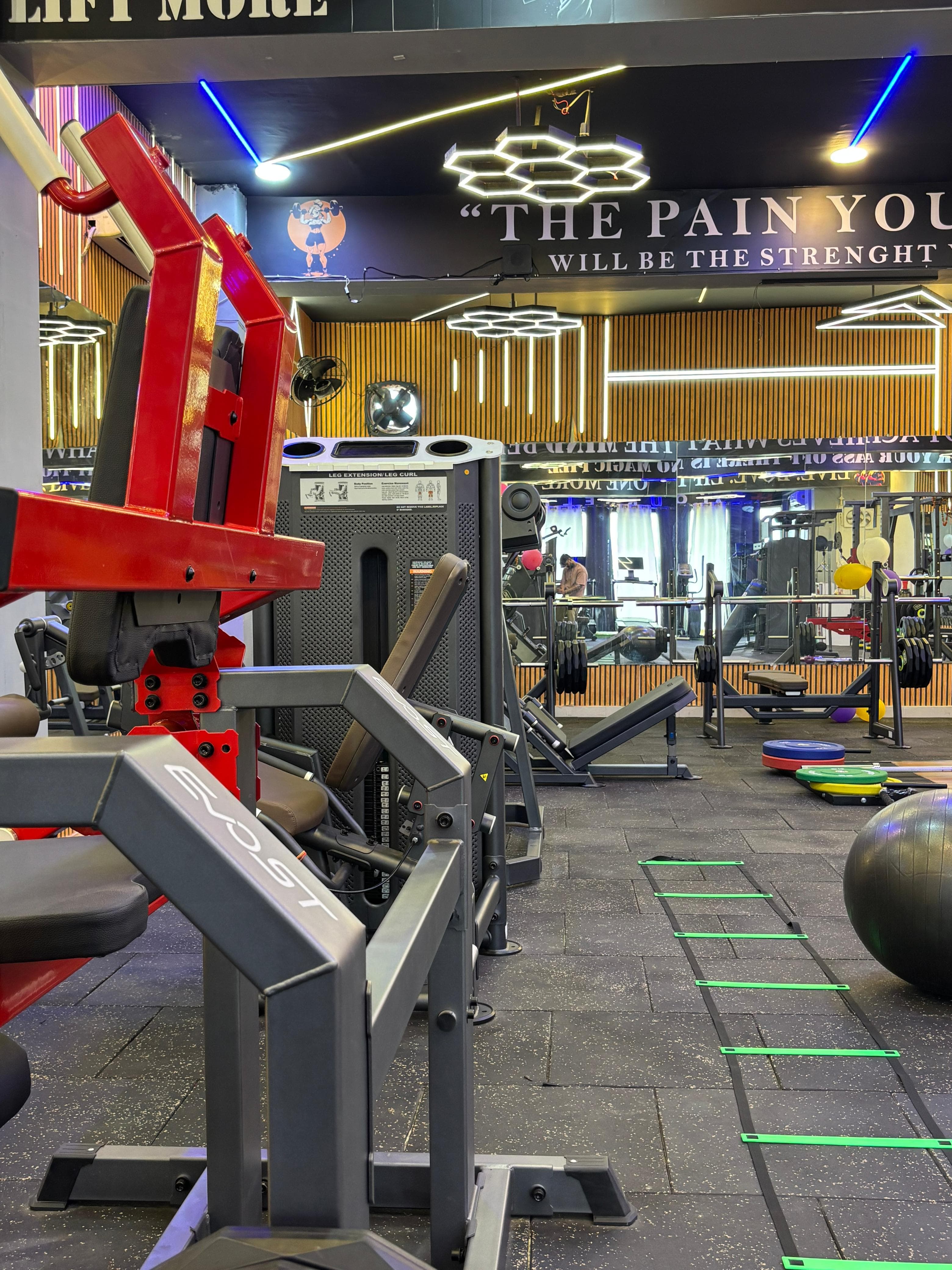 Rack of dumbbells and weights